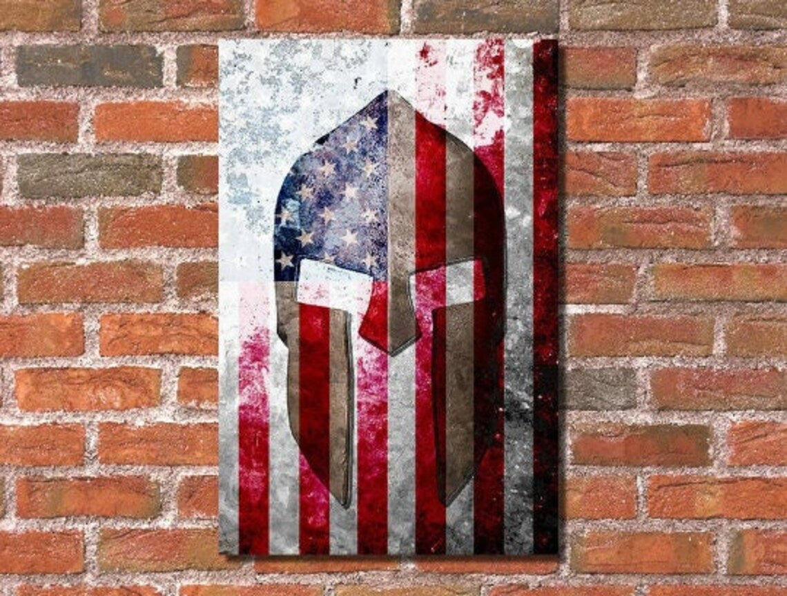 Spartan Helmet on Distressed American Flag Print on 16 by 24 inches Stretched Canvas hung on brick wall
