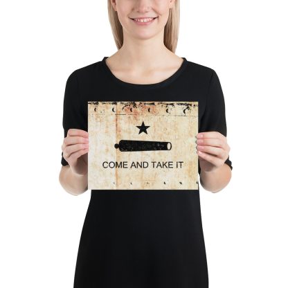 This is a museum-quality print of the iconic Come and Take It Gonzales Battle Flag on a rusted, riveted plate background.