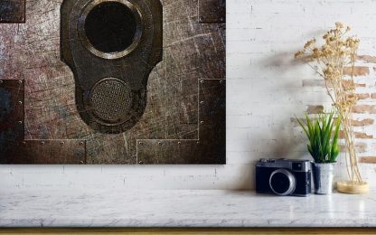 close up view of our M1911 Colt pistol muzzle on steel printed on eco friendly recycled aluminum hung on brick wall